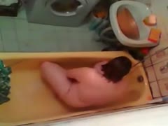 Mature wife masturbates in the bathroom having no idea about the cam hidden 